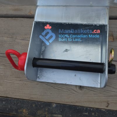 Integrated Fork Guide 3 | ManBaskets.ca Canadian-made Integrated Fork Guide interior showing welded guide channel and engineered retaining pin for telehandler jib safety.