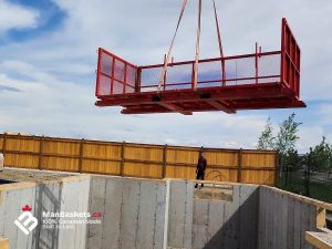 5×12 Heavy-Duty Telehandler Man Basket – Residential Framing Project 6 | ManBaskets.ca Custom Painted Man Basket in Active Construction Site | ManBaskets.ca