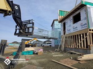 Extended Man Basket in Use for Window Installation | ManBaskets.ca